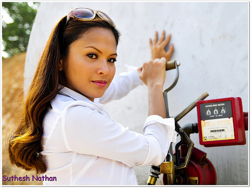 Beautiful gas pump attendant Sarita